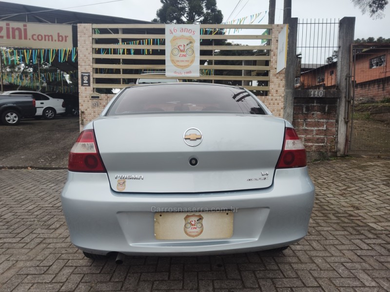 PRISMA 1.4 MPFI JOY 8V FLEX 4P MANUAL - 2009 - CANELA