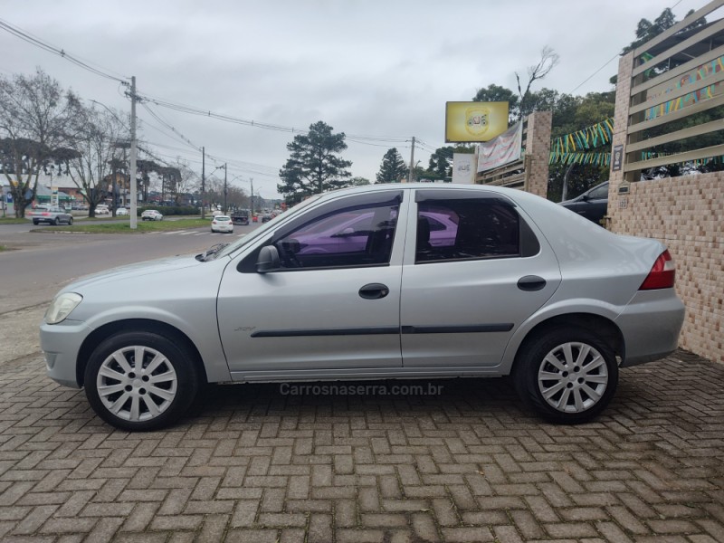 PRISMA 1.4 MPFI JOY 8V FLEX 4P MANUAL - 2009 - CANELA