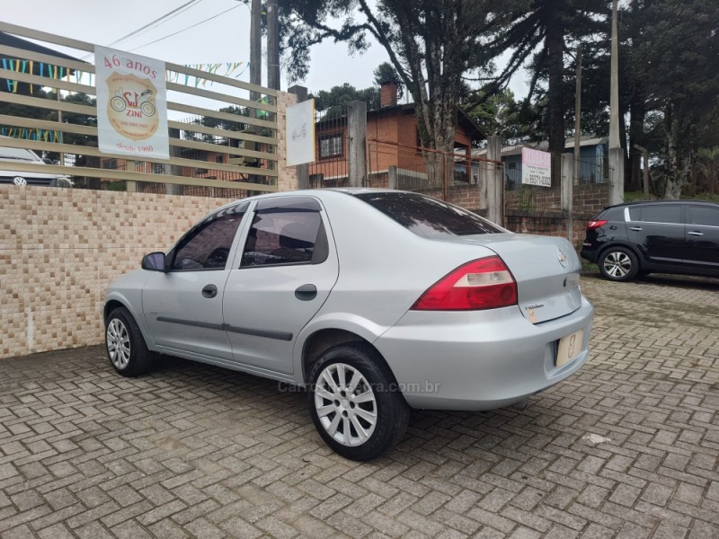 PRISMA 1.4 MPFI JOY 8V FLEX 4P MANUAL - 2009 - CANELA