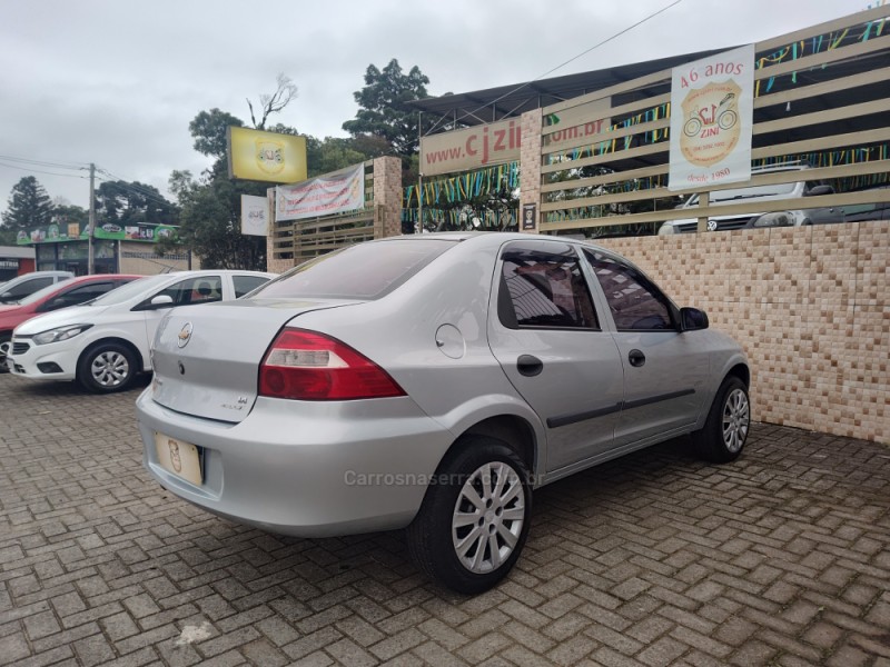PRISMA 1.4 MPFI JOY 8V FLEX 4P MANUAL - 2009 - CANELA