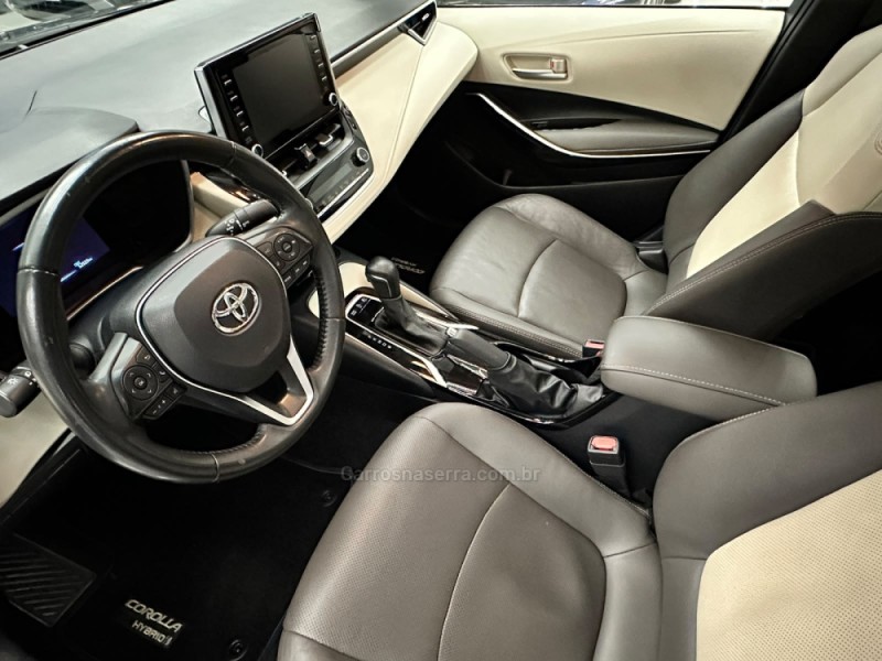 COROLLA 1.8 ALTIS PREMIUM 16V HÍBRIDO 4P AUTOMÁTICO - 2022 - SAPIRANGA