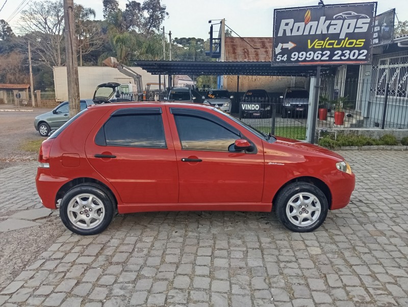 PALIO 1.0 MPI FIRE CELEBRATION ECONOMY 8V FLEX 4P MANUAL - 2010 - CAXIAS DO SUL