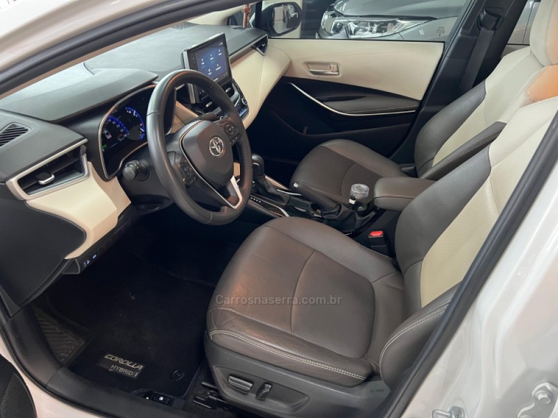 COROLLA 1.8 ALTIS PREMIUM 16V HÍBRIDO 4P AUTOMÁTICO - 2023 - CAXIAS DO SUL