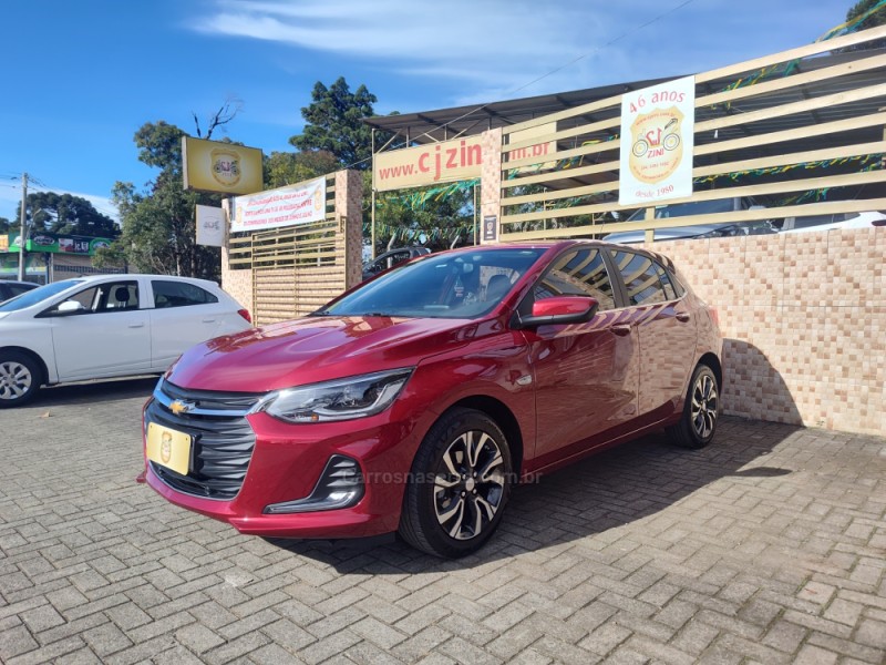 onix 1.0 premier ii 12v turbo flex 4p automatico 2024 canela