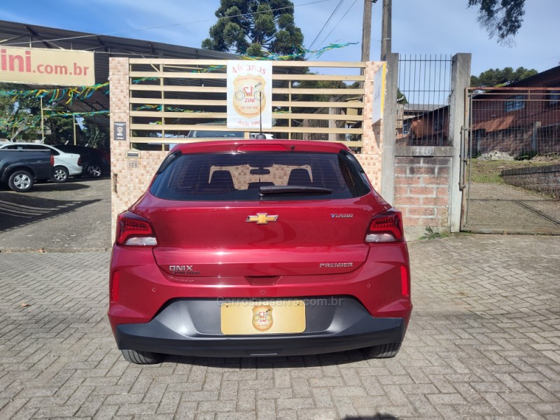 ONIX 1.0 PREMIER II 12V TURBO FLEX 4P AUTOMÁTICO - 2024 - CANELA