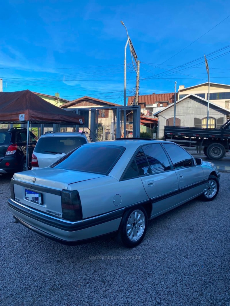 OMEGA  - 1996 - CAXIAS DO SUL