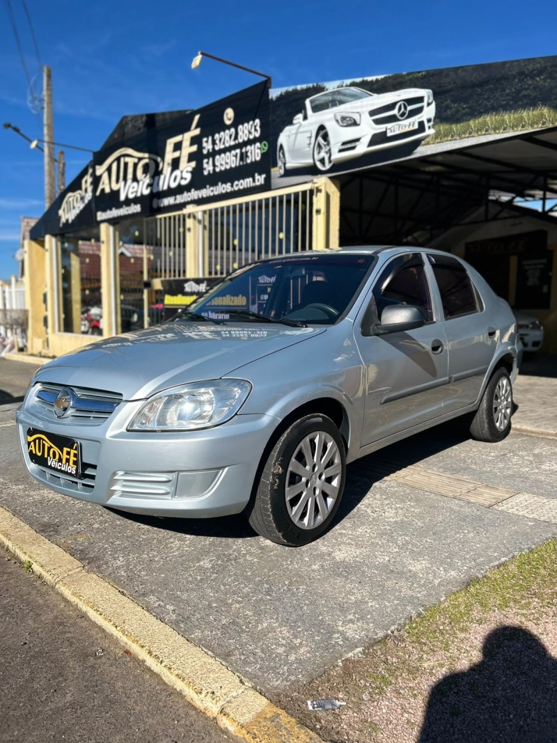 PRISMA 1.4 MPFI JOY 8V FLEX 4P MANUAL - 2009 - CANELA