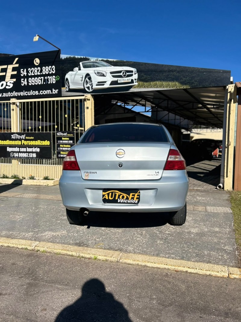 PRISMA 1.4 MPFI JOY 8V FLEX 4P MANUAL - 2009 - CANELA