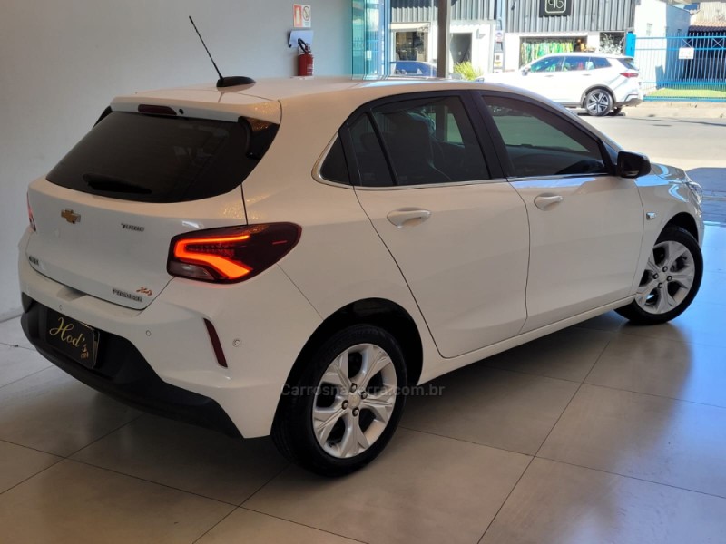ONIX 1.0 PREMIER II 12V TURBO FLEX 4P AUTOMÁTICO - 2021 - CANELA