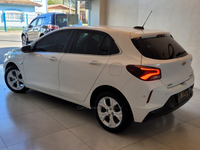 ONIX 1.0 PREMIER II 12V TURBO FLEX 4P AUTOMÁTICO - 2021 - CANELA