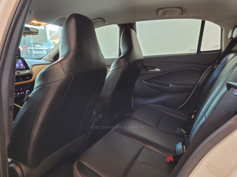 ONIX 1.0 PREMIER II 12V TURBO FLEX 4P AUTOMÁTICO - 2021 - CANELA