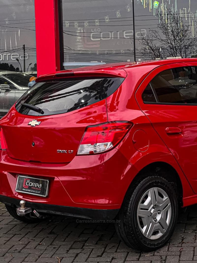 ONIX 1.0 LT 12V FLEX 4P MANUAL - 2013 - CANELA