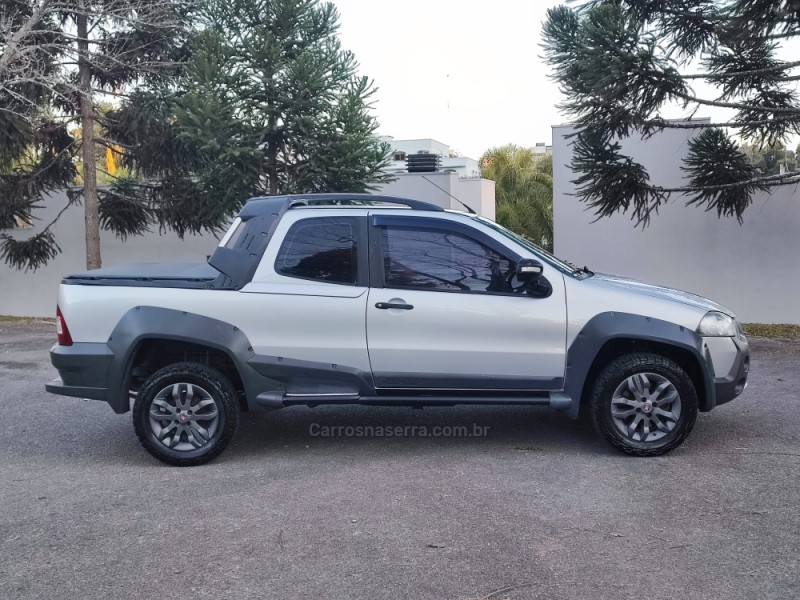 STRADA 1.8 MPI ADVENTURE LOCKER CD 8V FLEX 2P MANUAL - 2013 - FARROUPILHA
