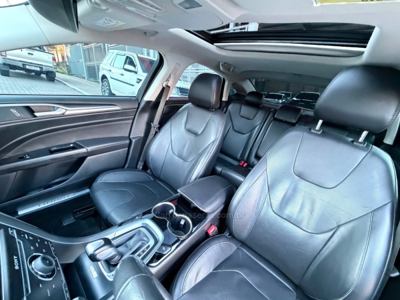 FUSION 2.0 TITANIUM AWD 16V GASOLINA 4P AUTOMÁTICO - 2015 - FELIZ