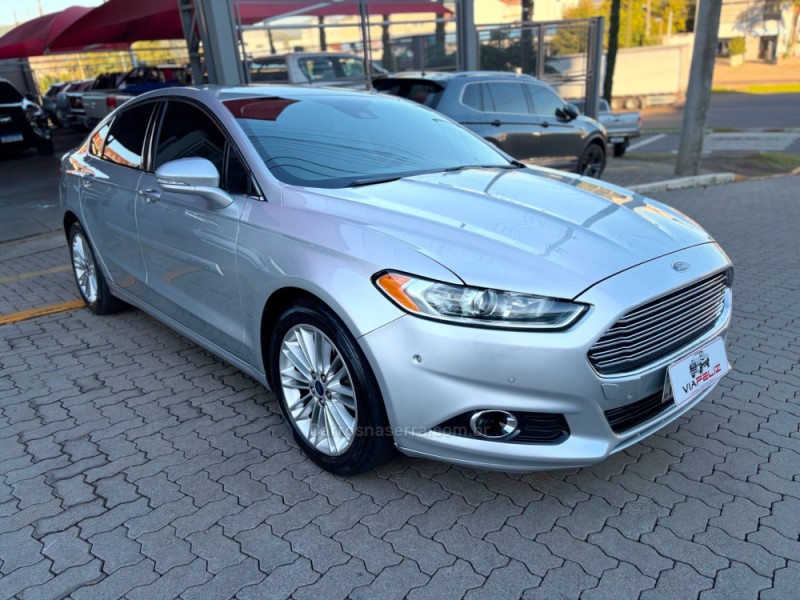 FUSION 2.0 TITANIUM AWD 16V GASOLINA 4P AUTOMÁTICO - 2015 - FELIZ