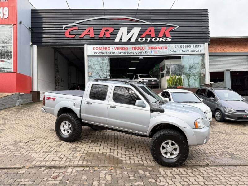 frontier 2.8 se 4x4 cd turbo diesel 4p manual 2004 dois irmaos