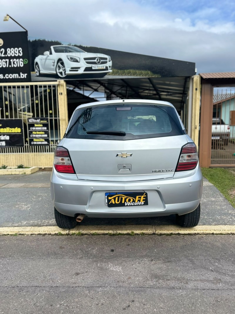 AGILE 1.4 MPFI LTZ 8V FLEX 4P AUTOMATIZADO - 2013 - CANELA