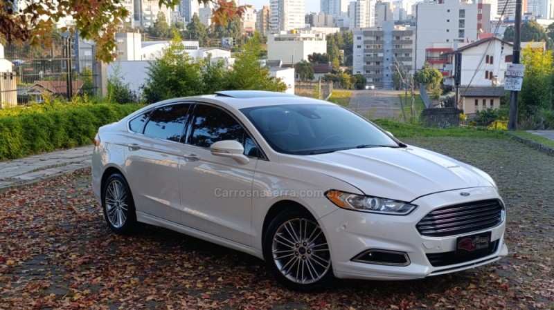 FUSION 2.0 TITANIUM PLUS AWD 16V GASOLINA 4P AUTOMÁTICO - 2014 - CAXIAS DO SUL
