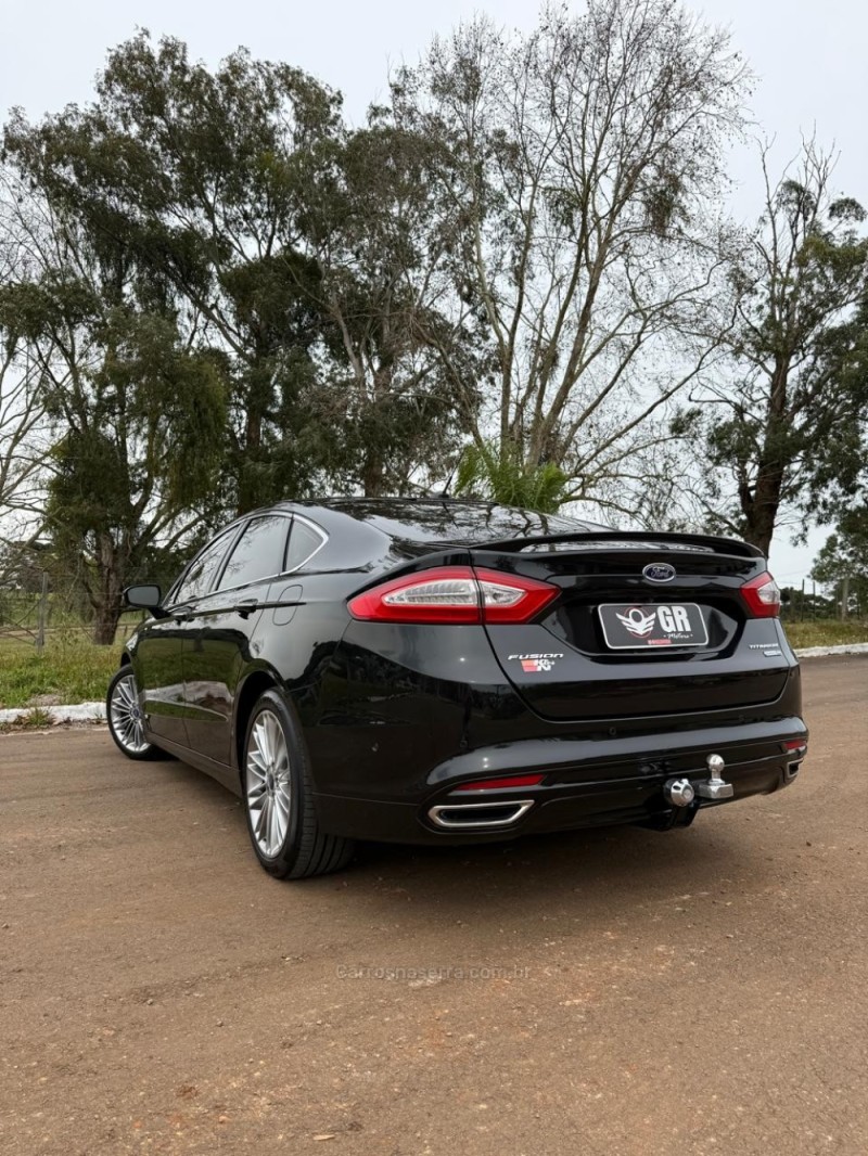 FUSION 2.0 TITANIUM AWD 16V GASOLINA 4P AUTOMÁTICO - 2014 - IBIRAIARAS