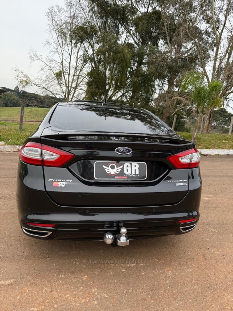 FUSION 2.0 TITANIUM AWD 16V GASOLINA 4P AUTOMÁTICO - 2014 - IBIRAIARAS