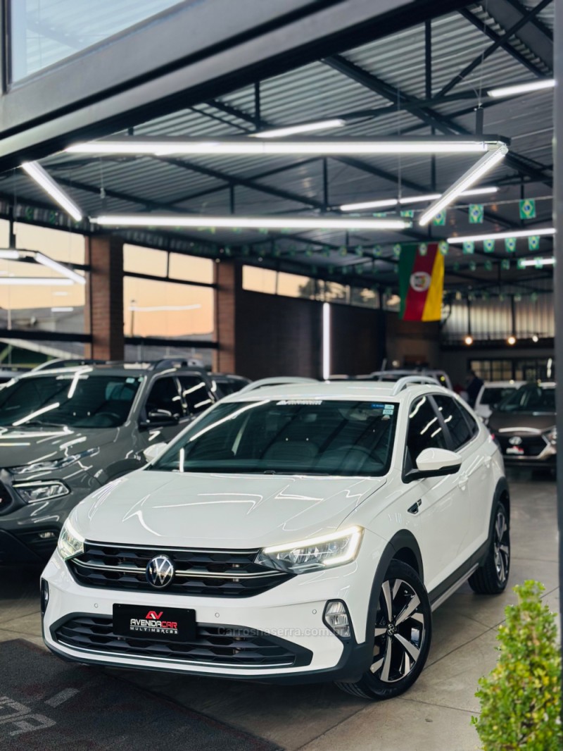 nivus 1.0 tsi highline flex 4p automatico 2023 canela