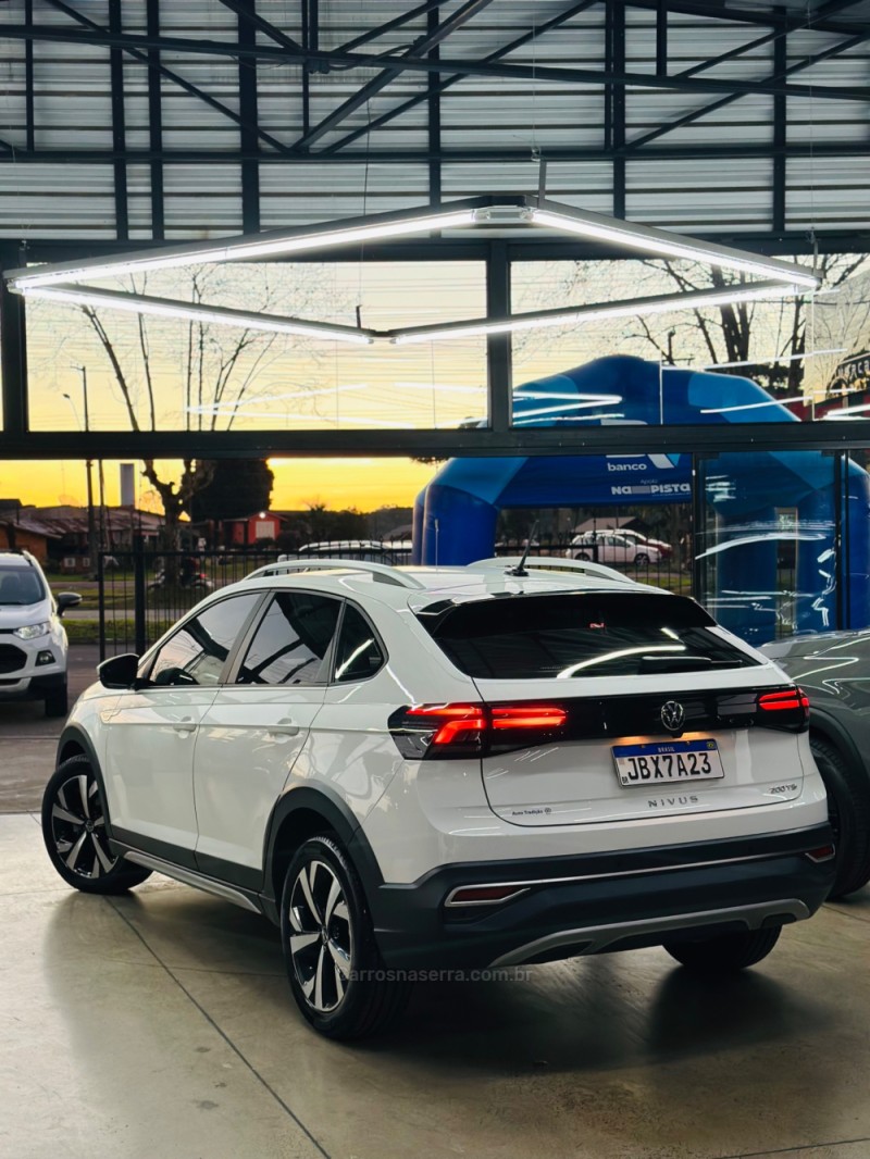 NIVUS 1.0 TSI HIGHLINE FLEX 4P AUTOMÁTICO - 2023 - CANELA