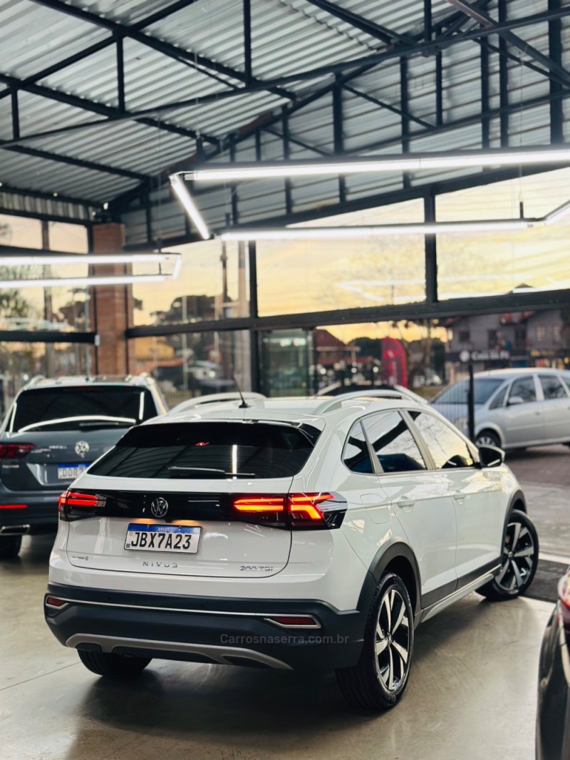 NIVUS 1.0 TSI HIGHLINE FLEX 4P AUTOMÁTICO - 2023 - CANELA