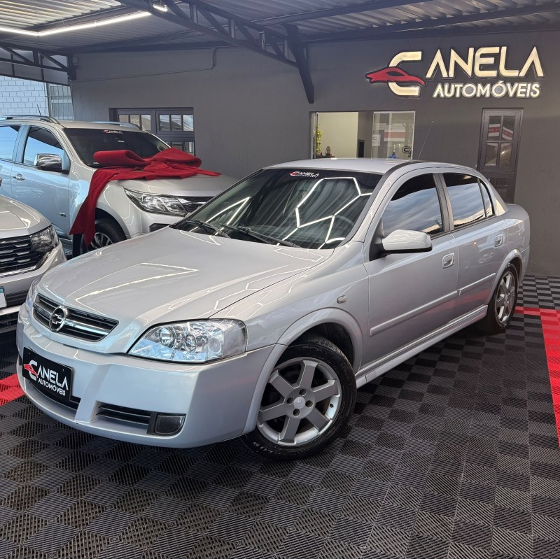 astra 2.0 mpfi elite sedan 8v flex 4p manual 2005 canela