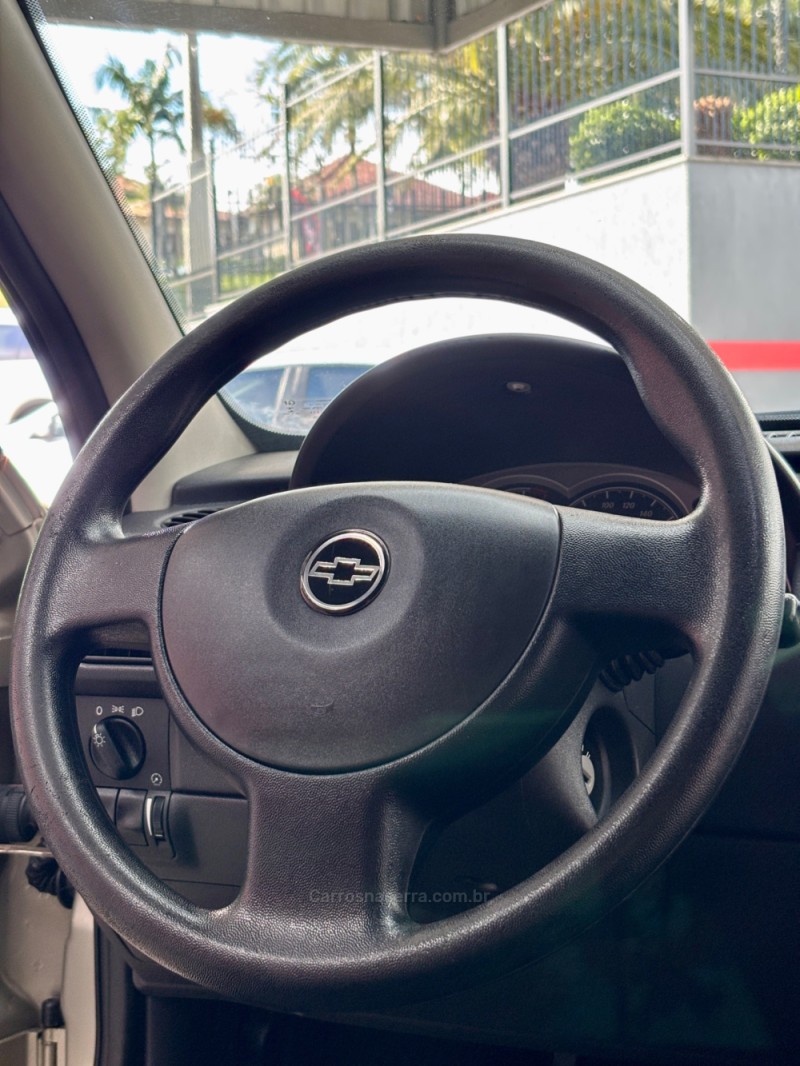 CORSA 1.0 MPFI PREMIUM 8V FLEX 4P MANUAL - 2010 - HARMONIA