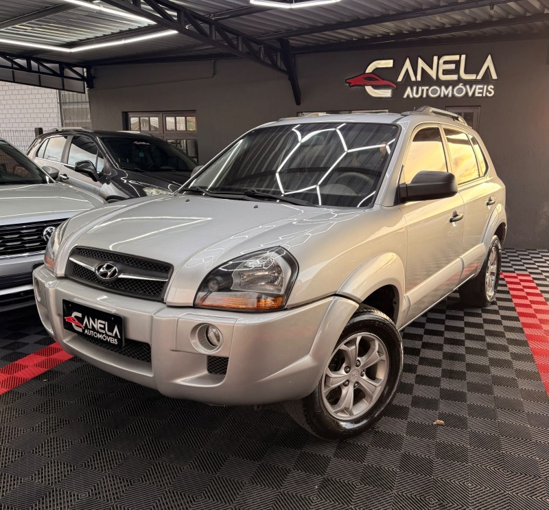 tucson 2.0 mpfi gl 16v 143cv 2wd gasolina 4p automatico 2010 canela
