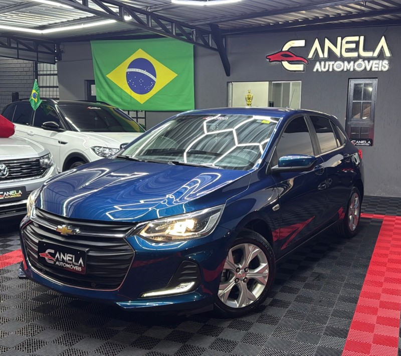 onix 1.0	premier ii plus 12v turbo flex 4p automatico 2020 canela