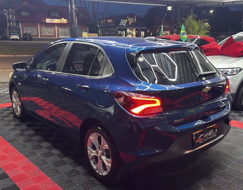 ONIX 1.0	PREMIER II PLUS 12V TURBO FLEX 4P AUTOMÁTICO - 2020 - CANELA