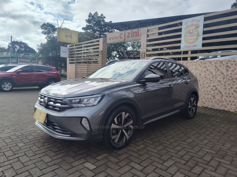 nivus 1.0 tsi highline flex 4p automatico 2021 canela