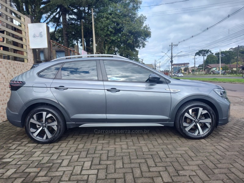 NIVUS 1.0 TSI HIGHLINE FLEX 4P AUTOMÁTICO - 2021 - CANELA