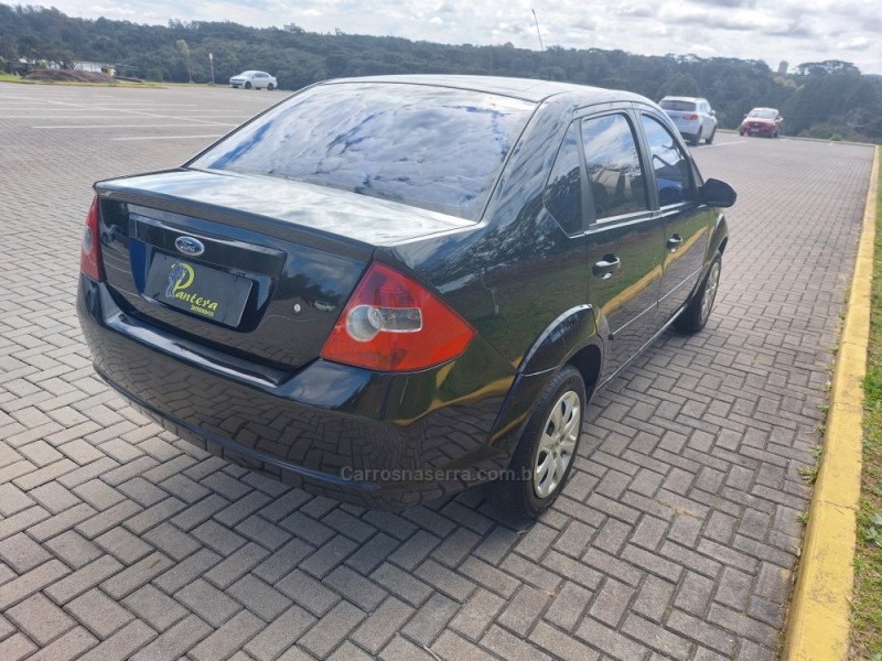 FIESTA 1.6 ROCAM SE PLUS SEDAN 8V FLEX 4P MANUAL - 2009 - CAXIAS DO SUL