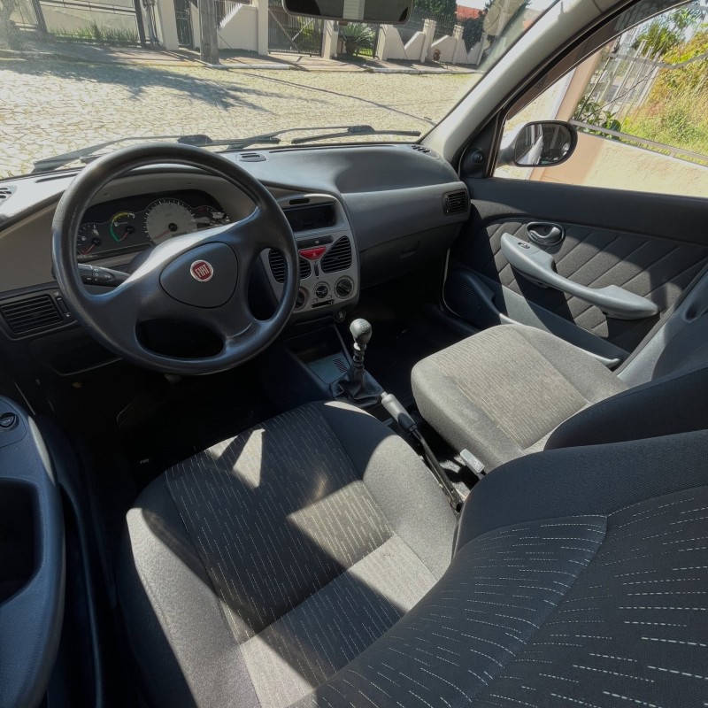 PALIO 1.0 MPI FIRE ECONOMY 8V FLEX 4P MANUAL - 2012 - NOVA PETRóPOLIS