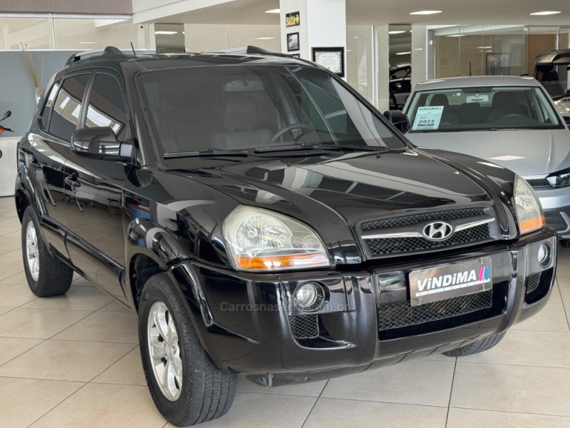 tucson 2.0 mpfi gls 16v 143cv 2wd flex 4p automatico 2013 flores da cunha