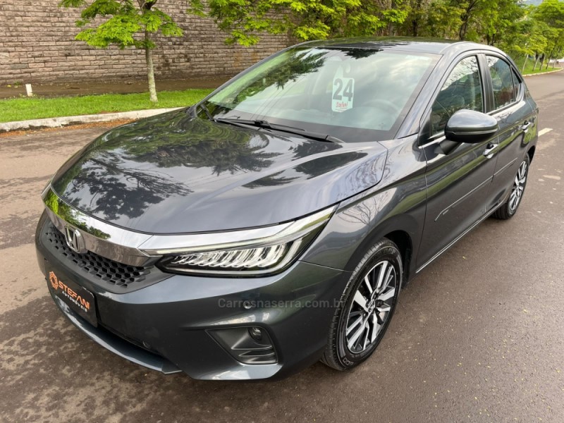 city 1.5 hatchback touring 16v flex 4p automatico 2024 feliz