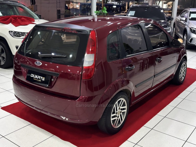 FIESTA 1.0 MPI PERSONNALITÉ 8V FLEX 4P MANUAL - 2003 - PORTO ALEGRE