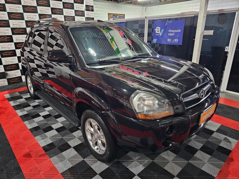 tucson 2.0 mpfi gls 16v 143cv 2wd flex 4p automatico 2013 caxias do sul