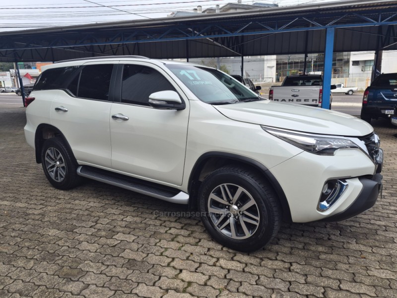 HILUX SW4 2.8 SRX 4X4 7 LUGARES 16V TURBO INTERCOOLER DIESEL 4P AUTOMÁTICO - 2017 - CAXIAS DO SUL