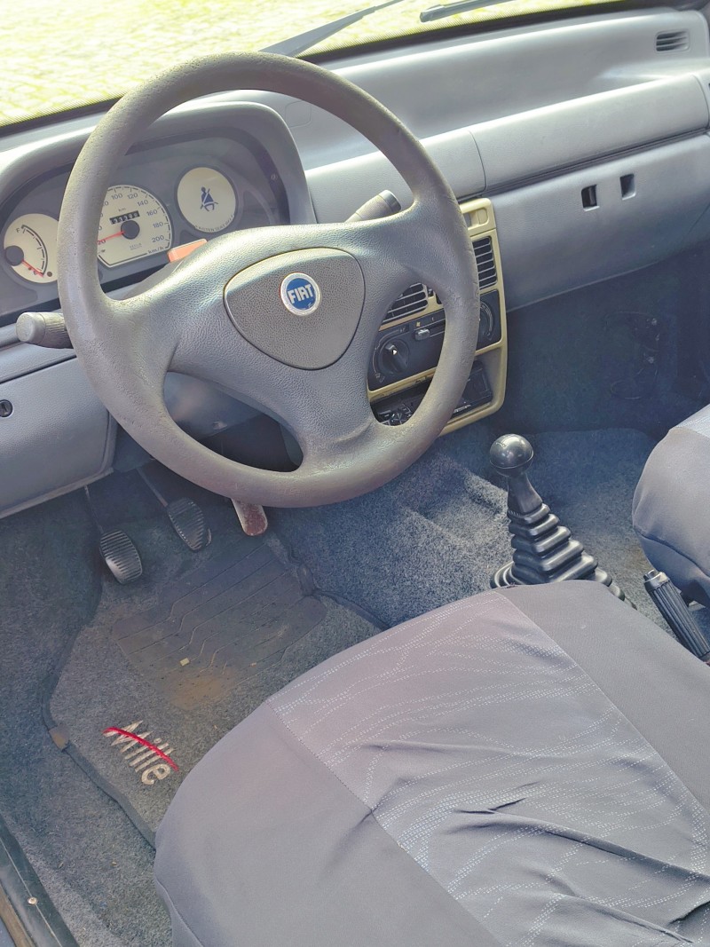 UNO 1.0 MPI MILLE FIRE 8V FLEX 2P MANUAL - 2003 - FARROUPILHA