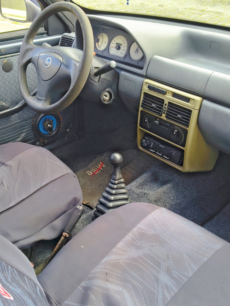 UNO 1.0 MPI MILLE FIRE 8V FLEX 2P MANUAL - 2003 - FARROUPILHA