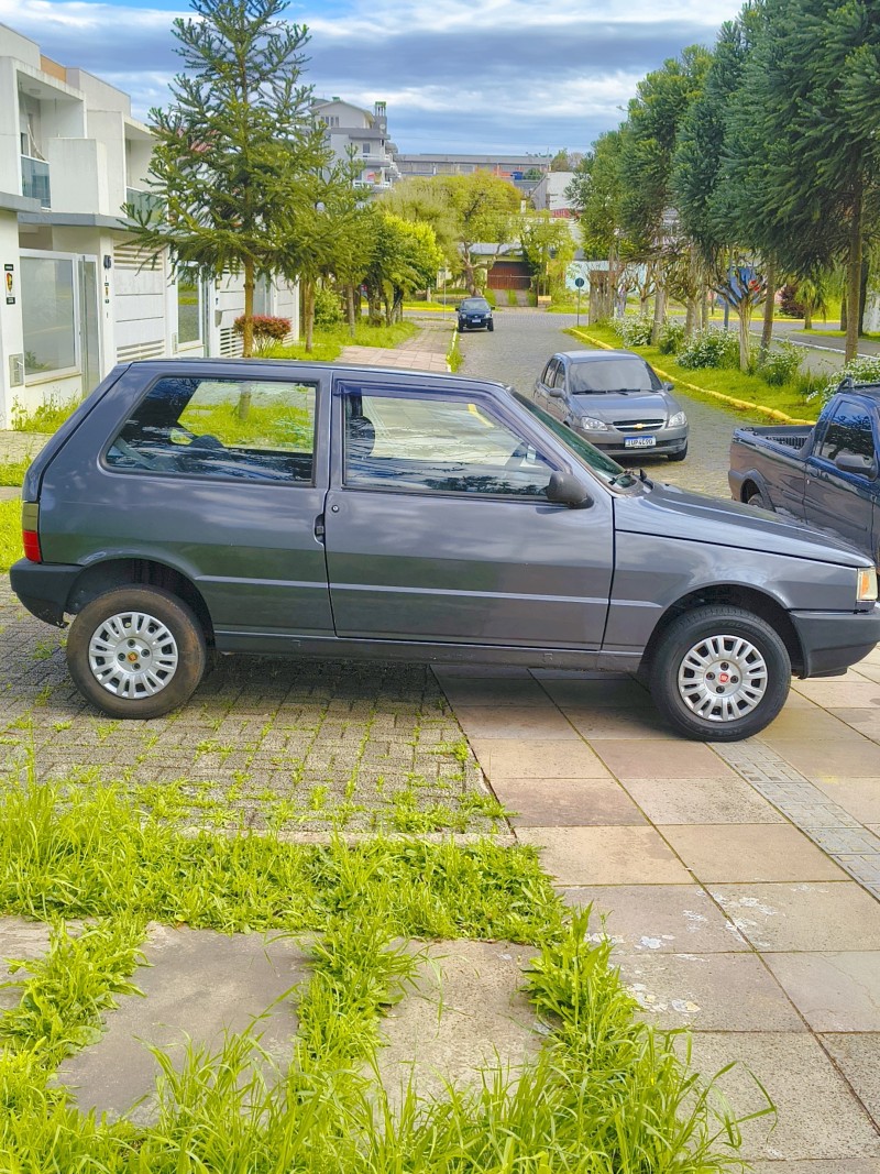 UNO 1.0 MPI MILLE FIRE 8V FLEX 2P MANUAL - 2003 - FARROUPILHA