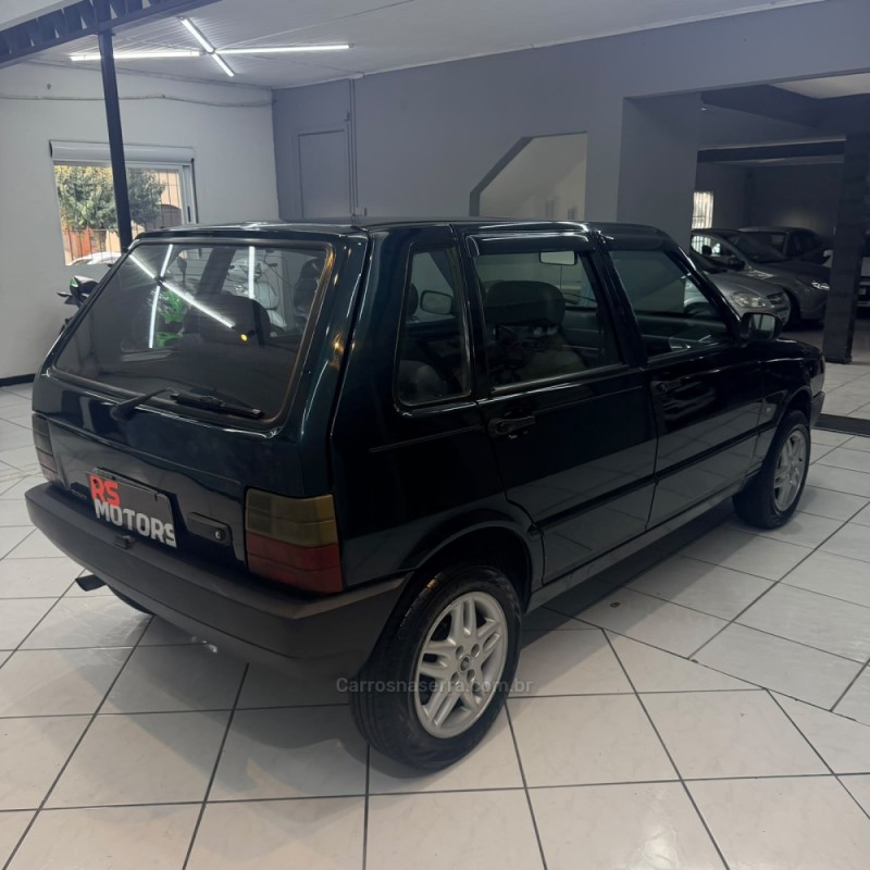 UNO 1.0 MPI MILLE FIRE 8V GASOLINA 4P MANUAL - 2002 - CAXIAS DO SUL