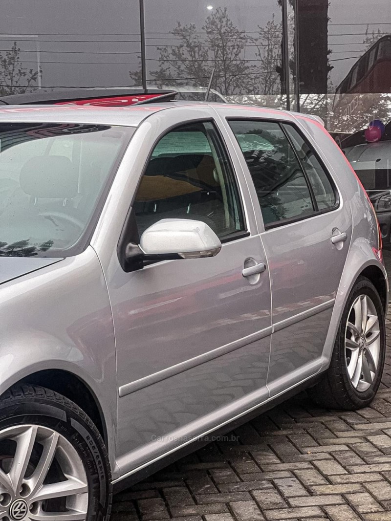 GOLF 1.6 MI SPORTLINE 8V FLEX 4P MANUAL - 2012 - CANELA