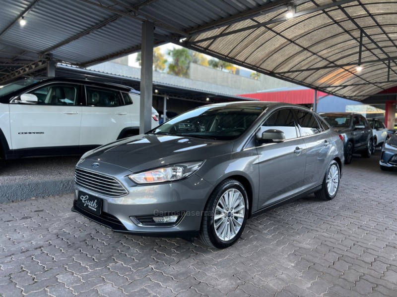 focus 2.0 titanium fastback 16v flex 4p automatico 2016 bom principio