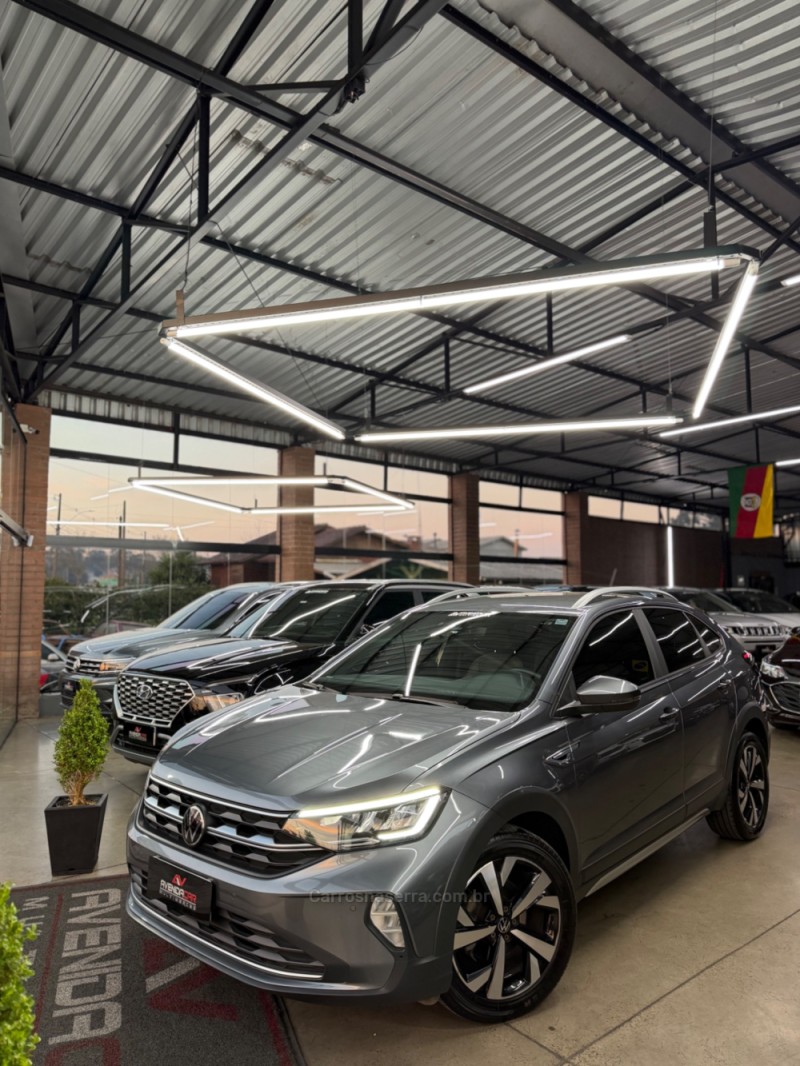 nivus 1.0 tsi highline flex 4p automatico 2023 canela