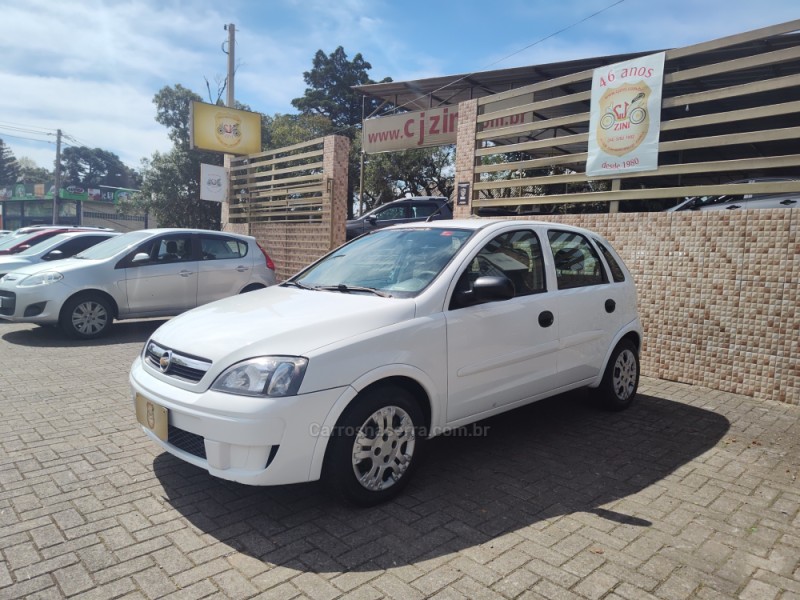 corsa 1.4 mpfi maxx 8v flex 4p manual 2011 canela
