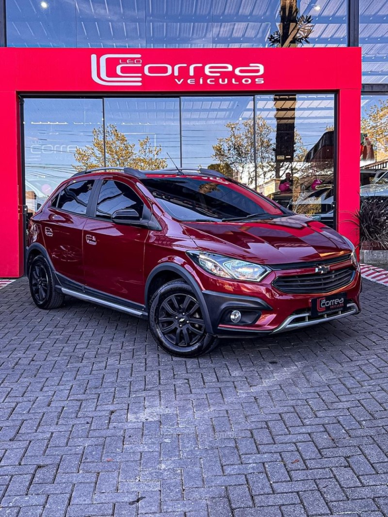 onix 1.4 mpfi activ 8v flex 4p automatico 2018 canela